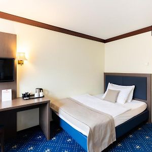 Kamer met een Queen Size Bed